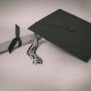 A graduation cap and diploma