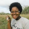 Karen Bailey holding a field mouse