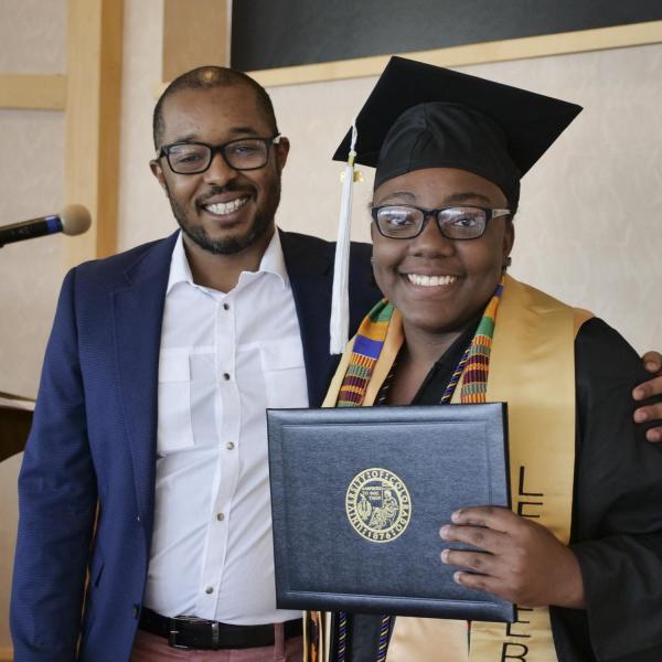 Camille Moore with Dr. Kwame Holmes