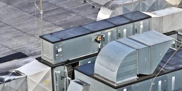 Air handling equipment on a building rooftop.