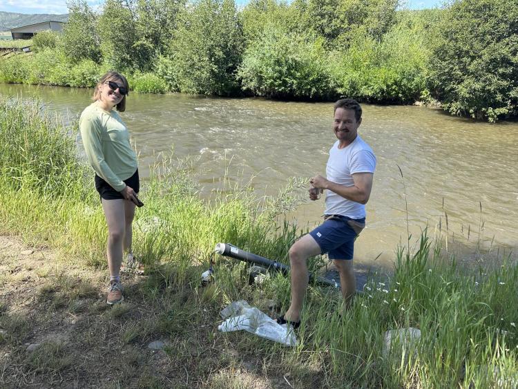 Here, Jason Quinn and I are installing an in-situ water quality sonde with sensors measuring turbidity, chlorophyl-a, conductivity, and fluorescing dissolved organic matter (fDOM) along the Yampa River near Steamboat Springs. These sensors (housed in the PVC tube visible in the picture) collect near-continuous data of in-stream water quality parameters and record the data using telemetry for real-time monitoring.