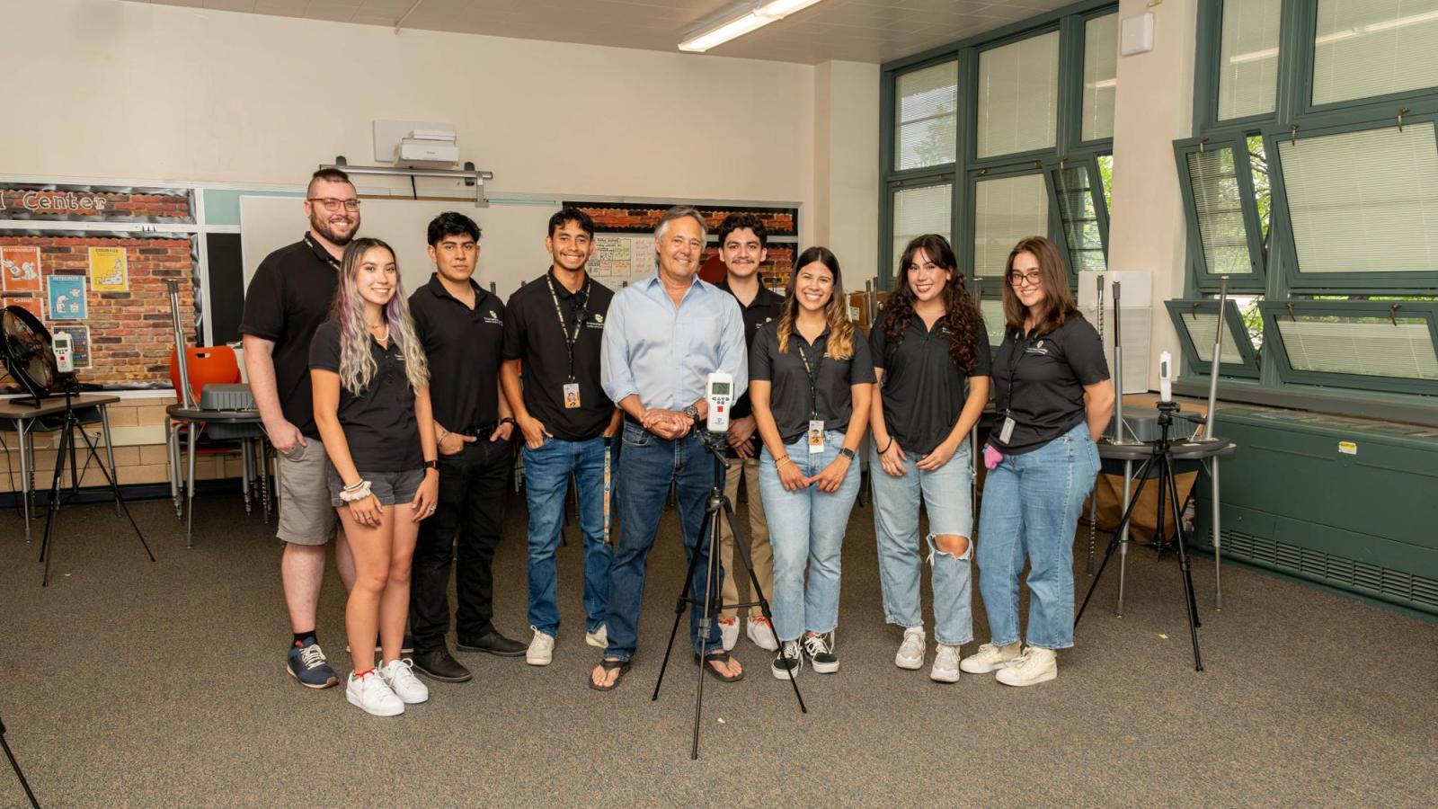 Mark Hernandez (middle) and his students installed air quality monitors and purifiers in Colorado classrooms