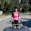 Sara Beck with her bike on the Tour de France route
