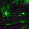 A powerful green laser helps visualize the aerosol plumes from a toilet when it’s being flushed.