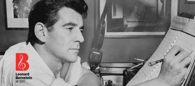 Leonard Bernstein composing music at the piano