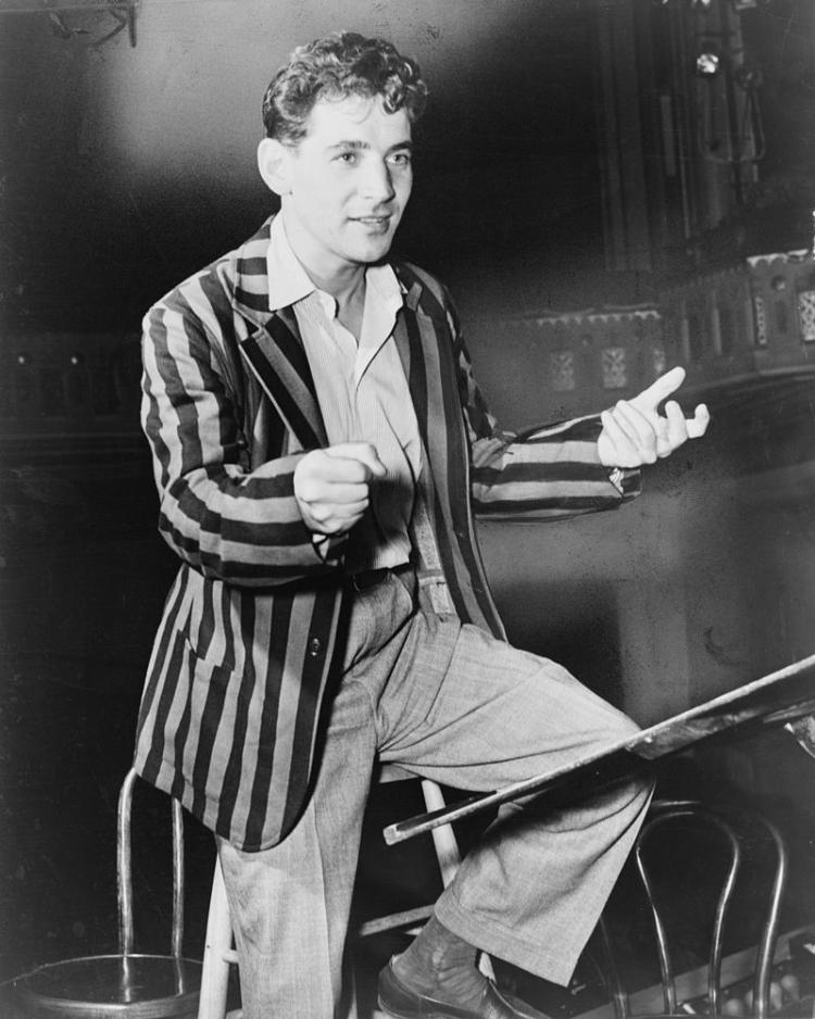 Bernstein on a stool conducting
