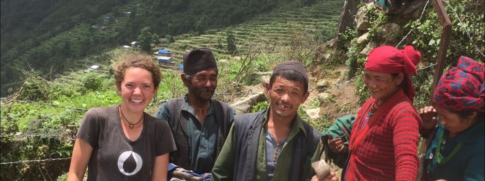 ewb member with community members