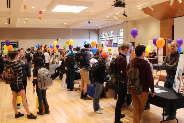 Students visit tables at the Off-Campus Housing Fair