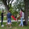 Group of friends hanging out on Norlin Quad on campus