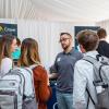 students talking at a career fair