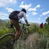 Person riding bike on the trails