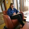 Student studying inside on cold day