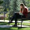 student studying on bench