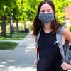 Student wearing a mask on campus.