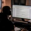 person working on computer late at night