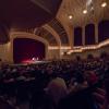 Attendees listen in during a lecture at Macky Auditorium