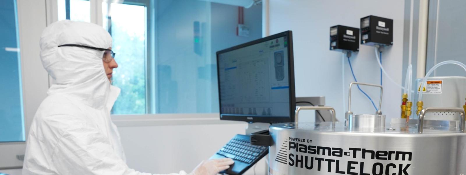 A researcher using the clean room facility