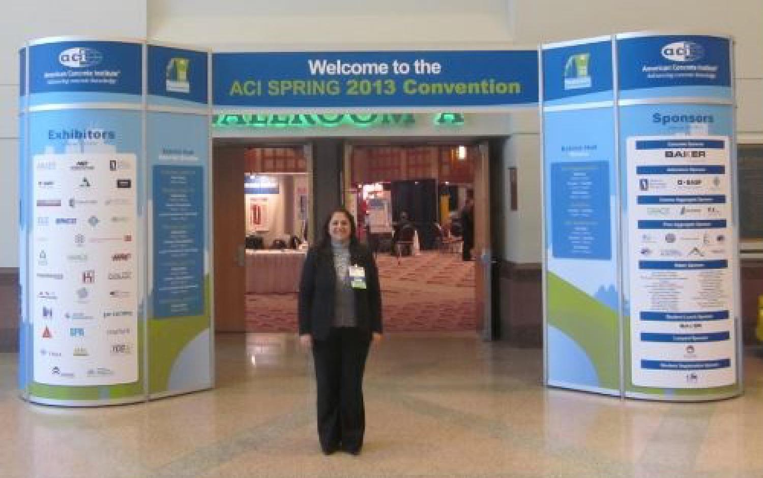 Dr. Al Wakeel standing in front of the the American Concrete Institute convention entrance