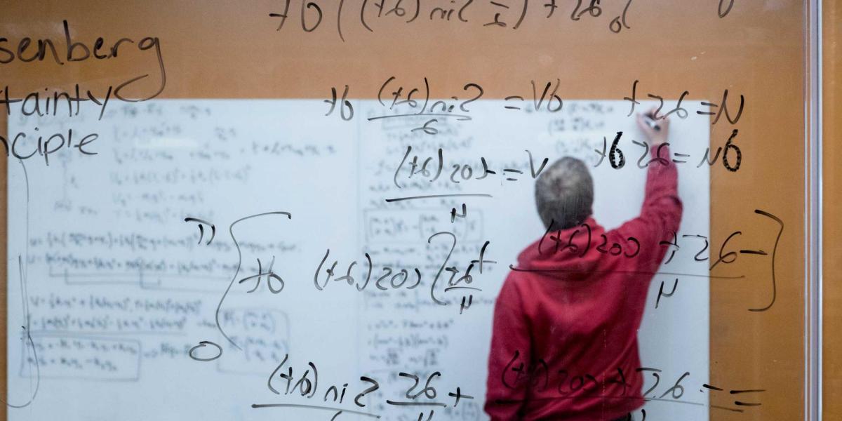 Professor teaching a math class