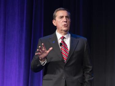 Photo of Dr. Jack Burns AAS meeting during an invited plenary address to the Society