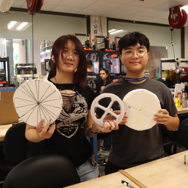 People showing off creations.