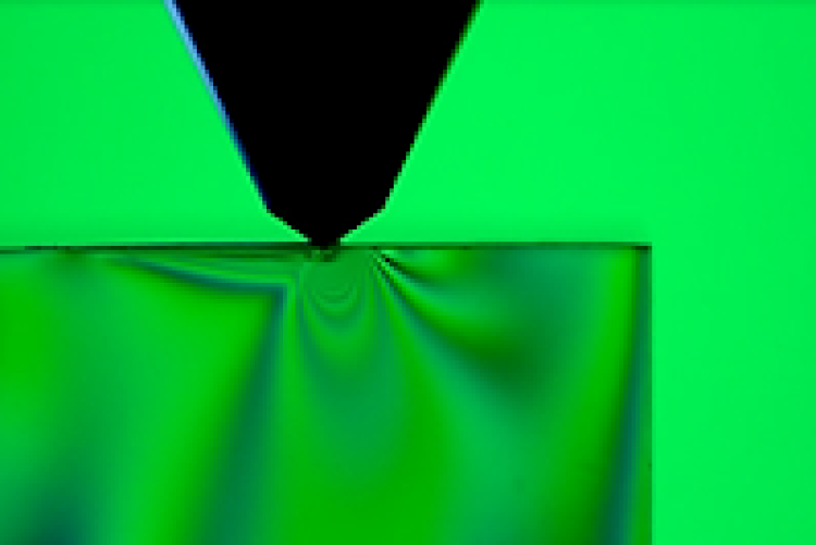 A microscopic view of a surface scratch