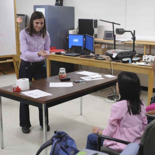 Juliet encourages student participation in front of the class.