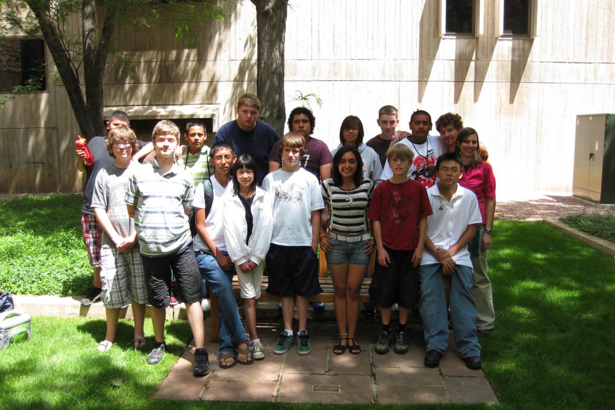 A group photo of Juliet and the participating students in the Engineering Center courtyard.