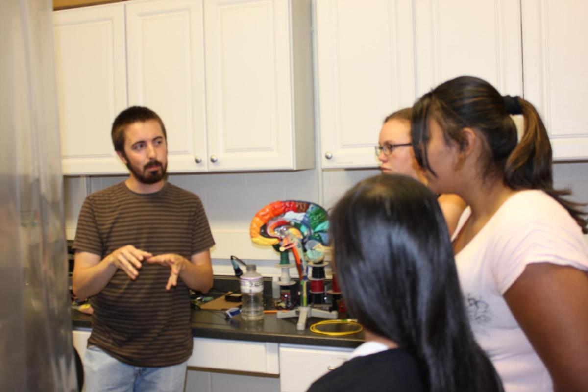 Kevin showing the students the areas of the brain that we will study.