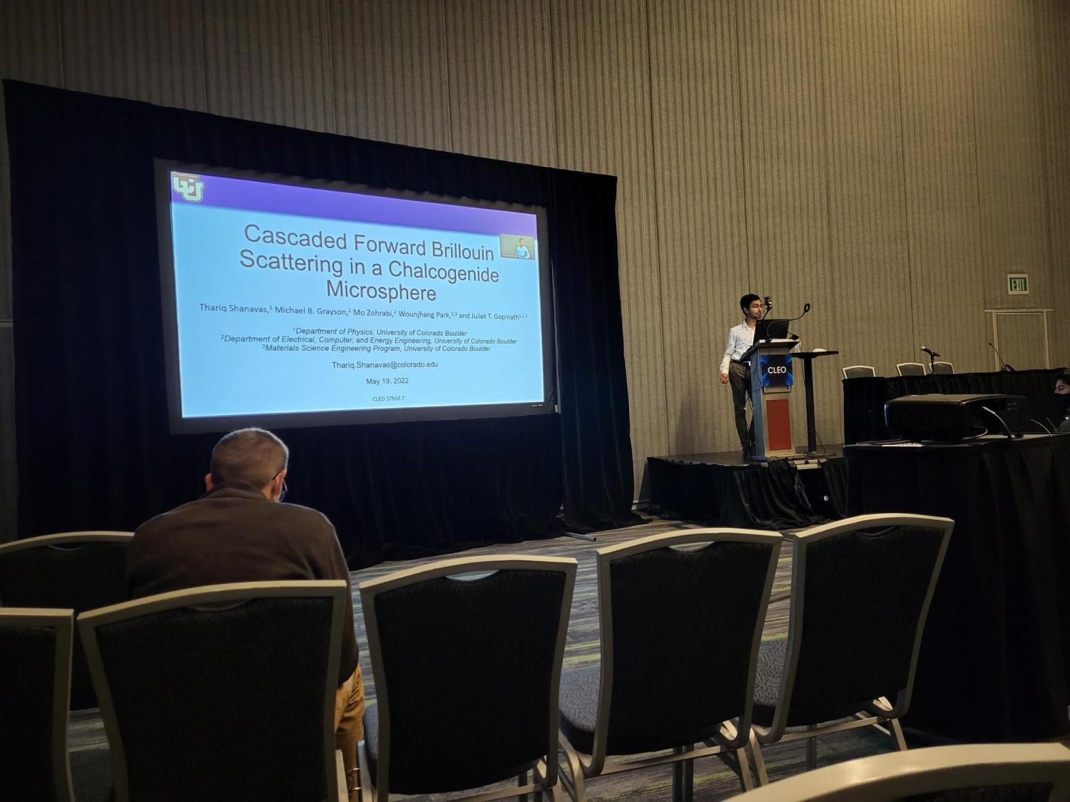 Thariq presenting a talk at CLEO