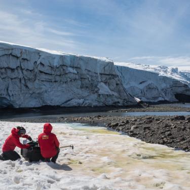 Alia Khan and colleague collecting data in Antarctica