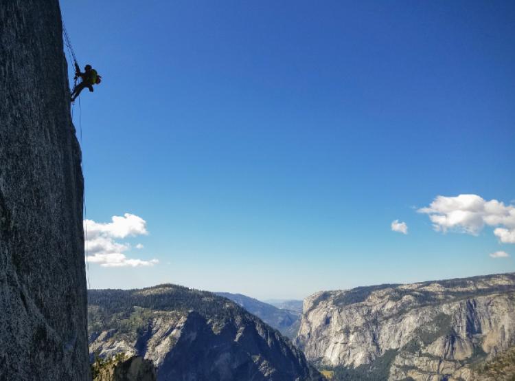 Charlie Rackson climbing Half Dome.
