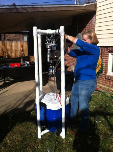 Scientist setting up the outdoor sampling station used in this study