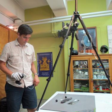 A photo of myself photographing a Linear B tablet in the National Museum