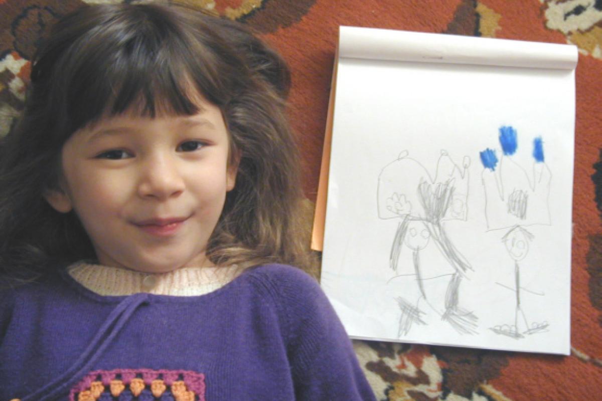 Sarah and her artwork (Nov. 2001).​