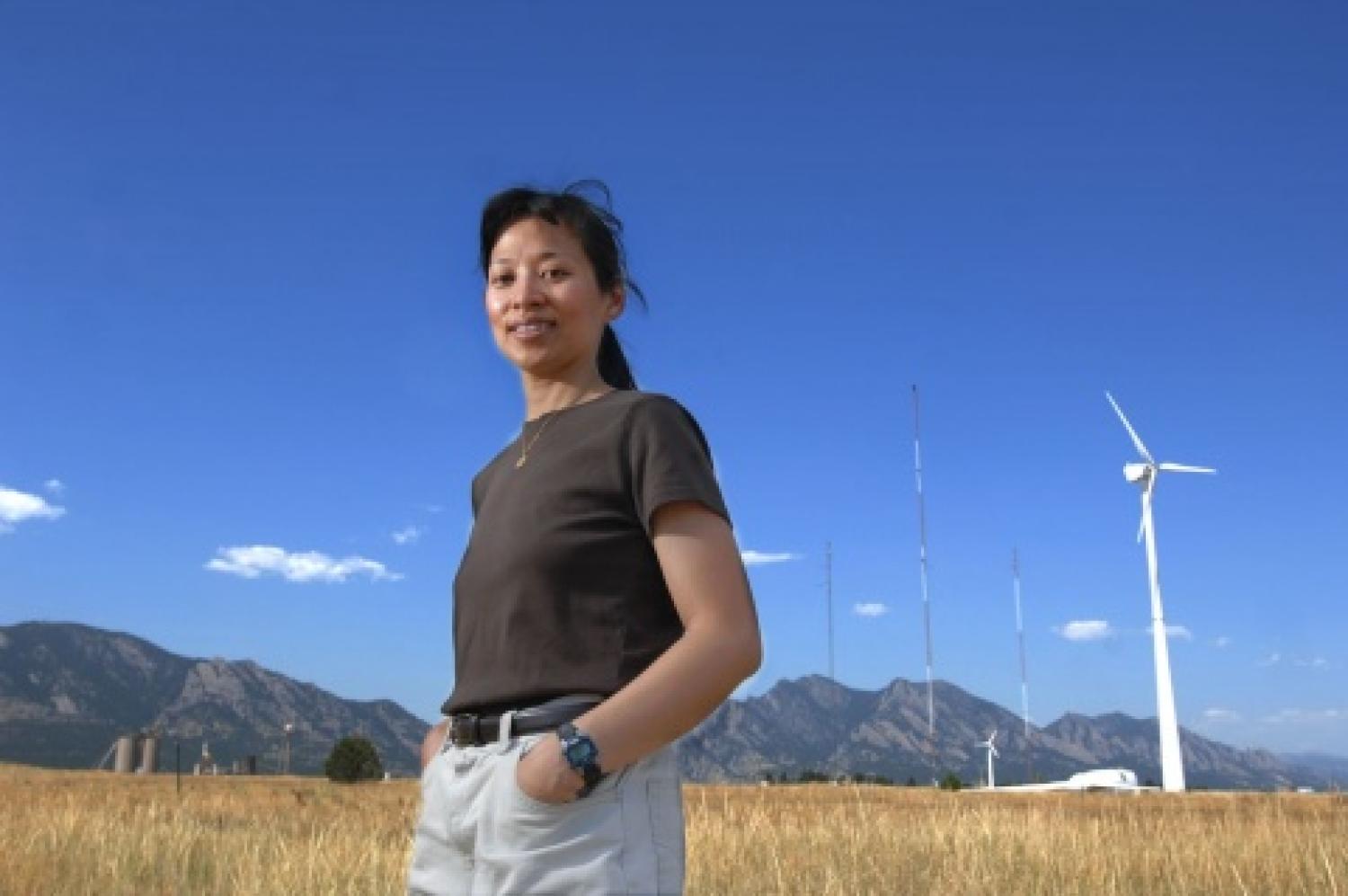 Lucy Pao with wind turbines in the background