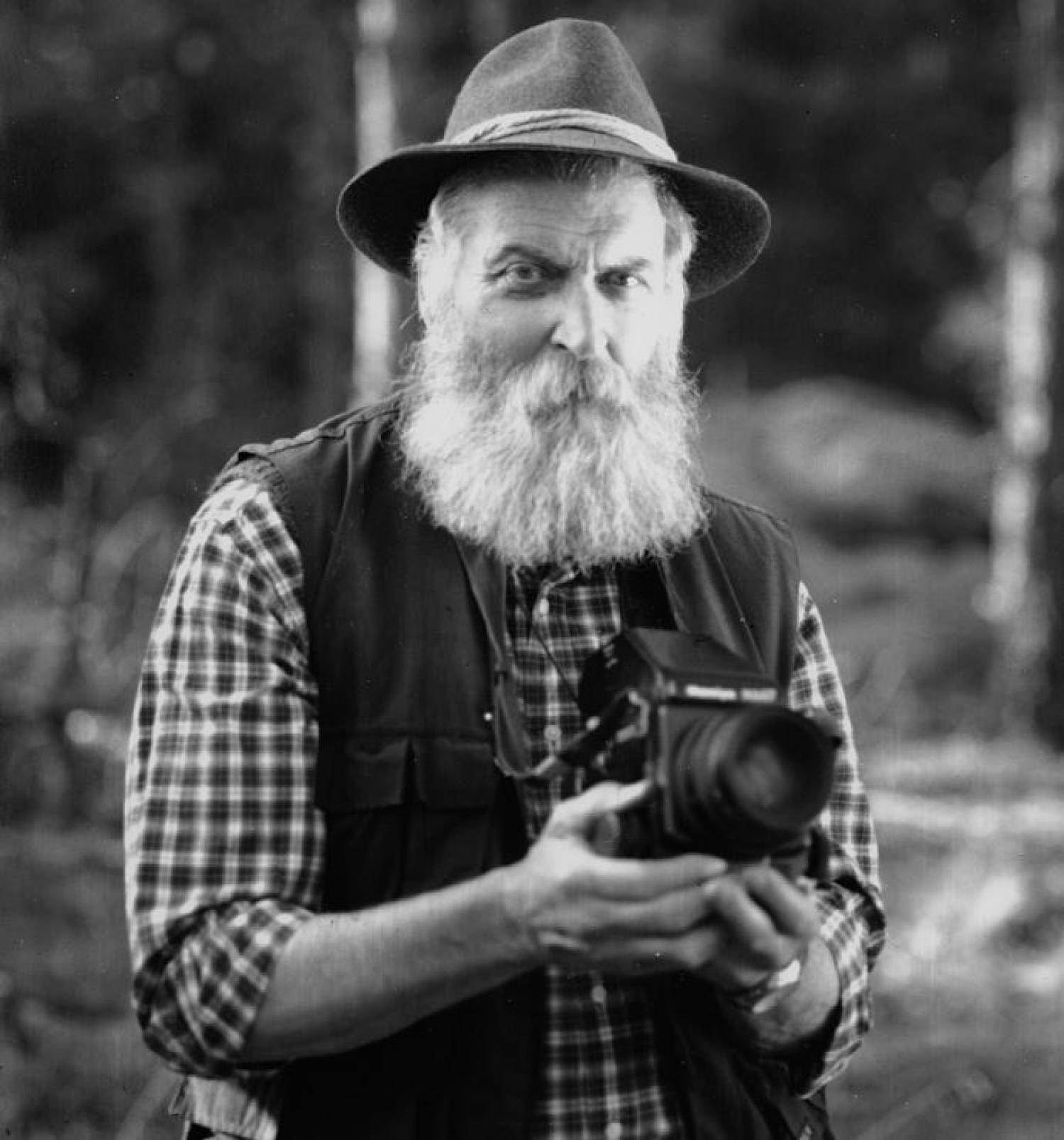 Tad Pfeffer holding a camera