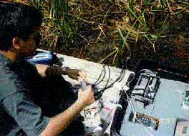 ravichandran collecting surface water samples