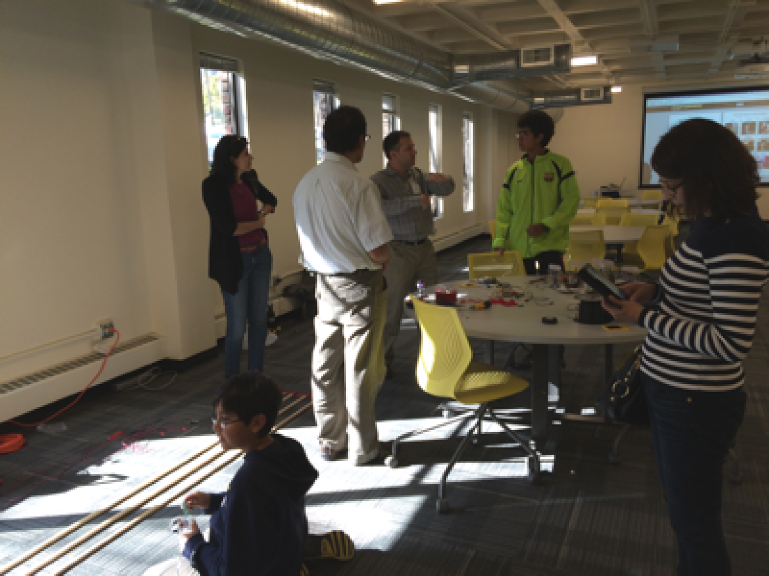 A group of students talking together at the Race the Sun event