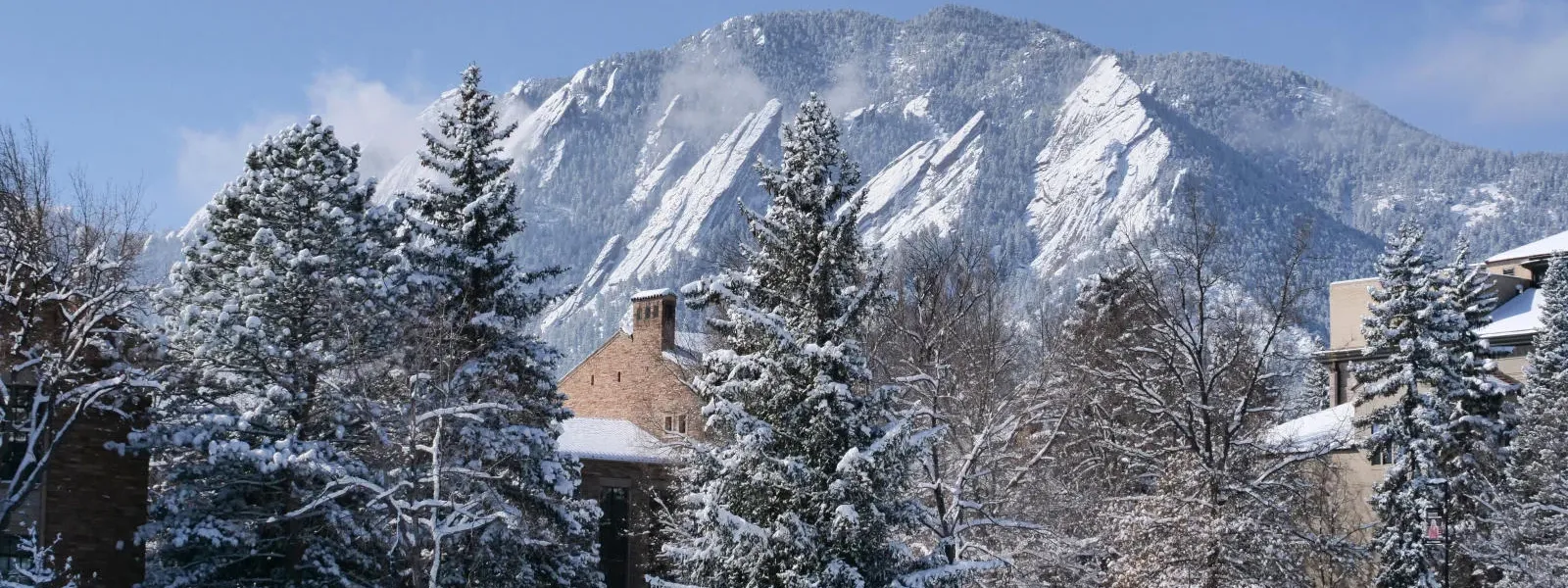 Snowy scene of the Flatirons