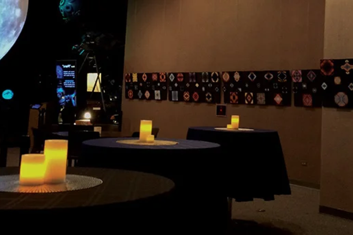 Fiske lobby decorated for a party with tables and candles