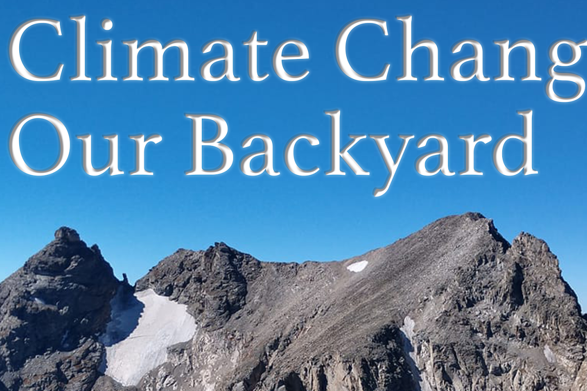 Mountain peak with blue sky and climate change in our backyard text