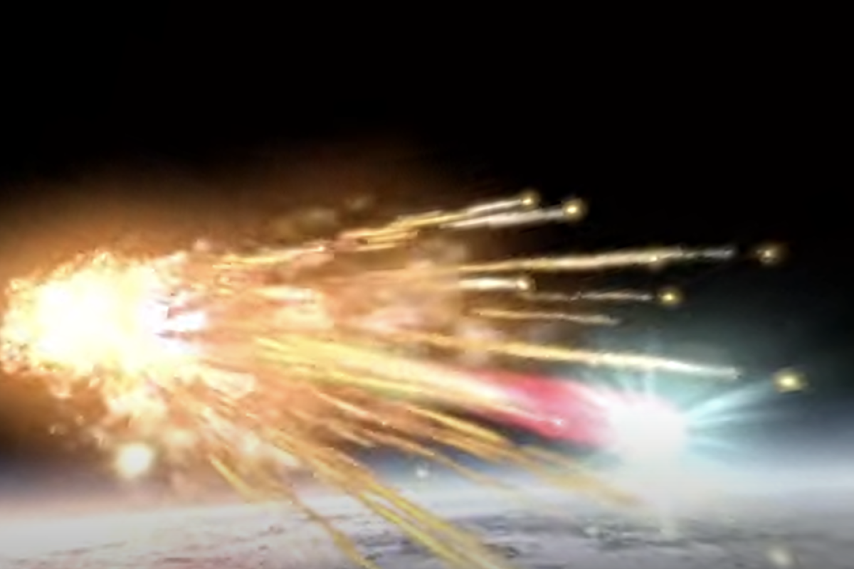 Still image from film of an exploding comet entering earth's atmosphere