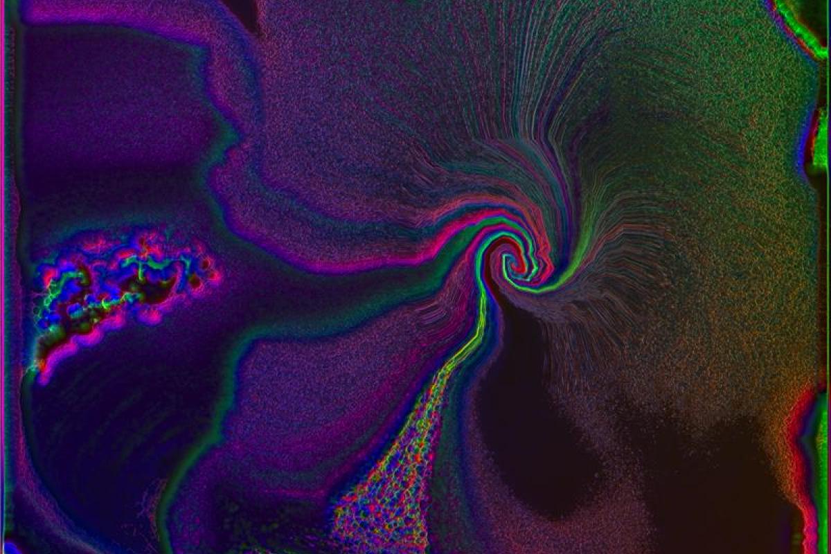 Abstract graphic image with a slight swirl in purple, green and red