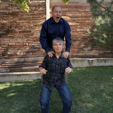 John and Tito being silly and jumping