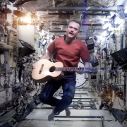 Chris Hatfield and his guitar aboard the ISS covering Space Oddity