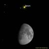 Graphic showing a close up of the waxing gibbous moon and saturn above