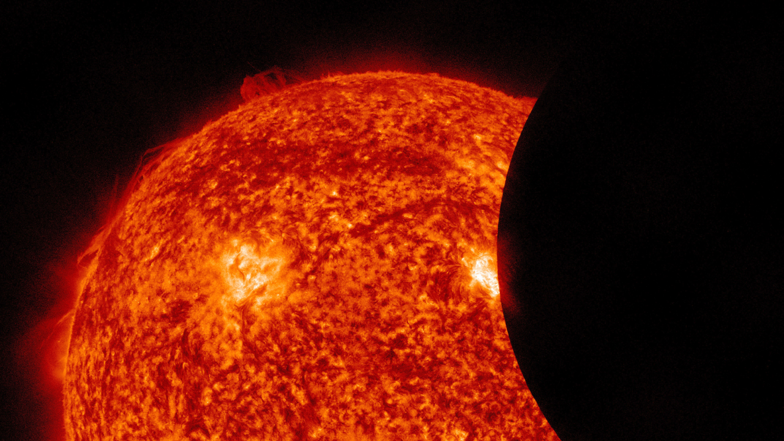 Photo from NASA SDO of the Sun in h-alpha and the moon during an eclipse