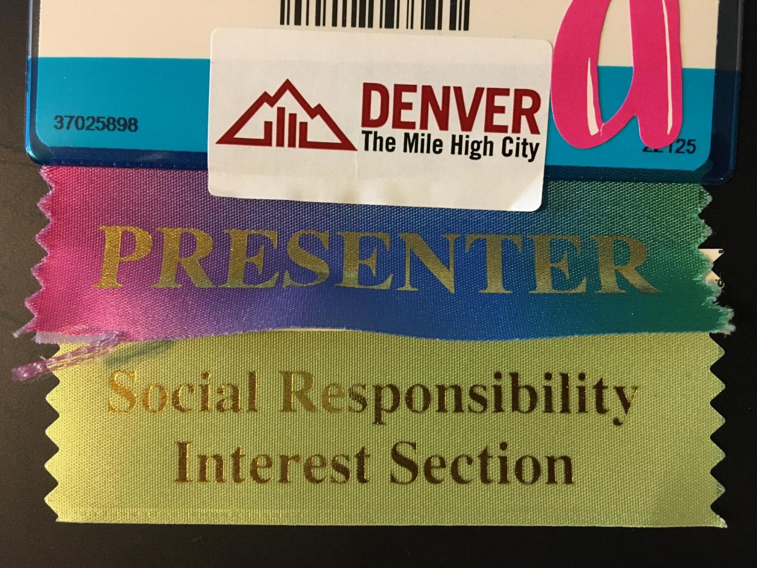 close-up of nametag with ribbons