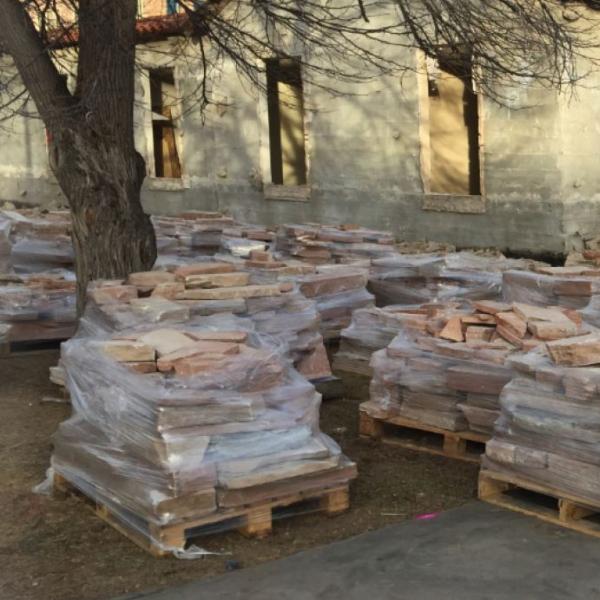 Stone is palletized for use on new building